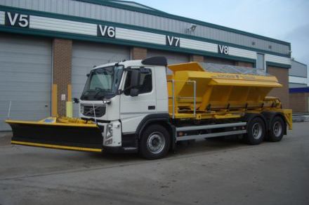 Volvo chassis with plough and gritter.